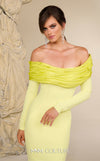 MNM Couture Style F02928 showcasing a dramatic mermaid silhouette dress in vibrant fuchsia, olive, or pink crepe, featuring pleated straight-across neckline, off-shoulder long sleeves, and a flowing train. | Couture Shop LA.