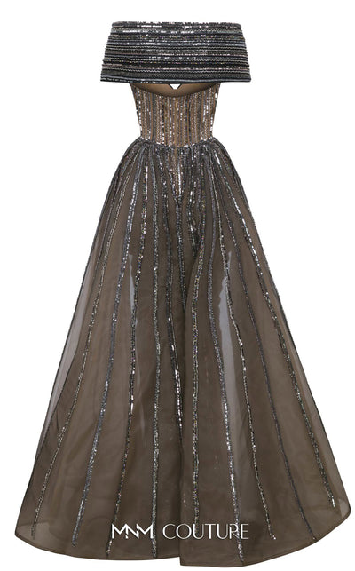 MNM Couture Style F02929 showcasing a dramatic off-the-shoulder A-line gown with dark sequin and bead embellishments and a full, vertically striped tulle overlay. | Couture Shop LA