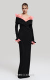 MNM Couture Style F02941 showing a black form-fitting evening gown with a pink off-the-shoulder ruffle detail, matching ruffled cuffs on the long sleeves, and a high back slit. | Couture Shop LA