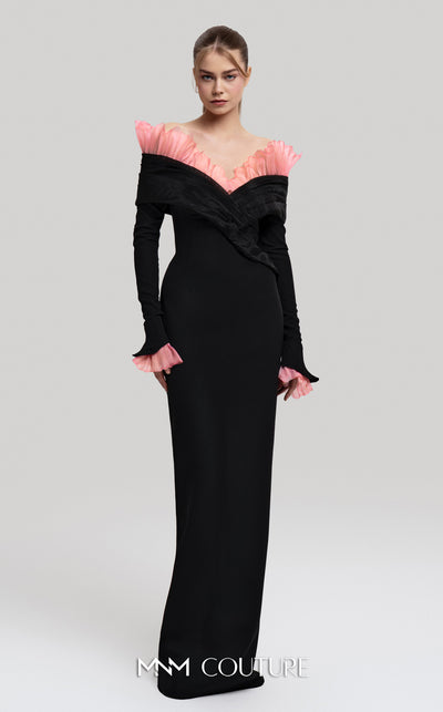 MNM Couture Style F02941 showing a black form-fitting evening gown with a pink off-the-shoulder ruffle detail, matching ruffled cuffs on the long sleeves, and a high back slit. | Couture Shop LA
