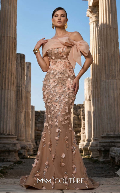 MNM Couture F02950A soft mesh mermaid gown with laser-cut floral appliqués, sequin shimmer, and draped sheer bow neckline | Couture Shop LA.