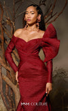 MNM Couture F02982 textured jacquard gown with off-the-shoulder long sleeves, pleated fans on the left shoulder, and a dramatic back train.|Couture Shop LA