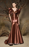 MNM Couture F02993 metallic satin mermaid gown with off-the-shoulder design, floral accents on the shoulders, and a dramatic train.|Couture Shop LA