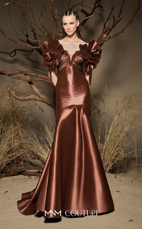 MNM Couture F02993 metallic satin mermaid gown with off-the-shoulder design, floral accents on the shoulders, and a dramatic train.|Couture Shop LA
