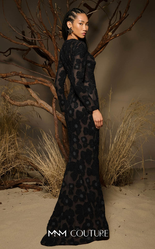 MNM Couture F02997 sheer tulle gown with fitted long sleeves, floral appliqués on side panels, and a subtle train.|Couture Shop LA