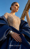 MNM Couture F03004 embroidered sequin mermaid gown with contrasting satin long cape, puffy sleeves, small train, and fitted silhouette | Couture Shop LA.