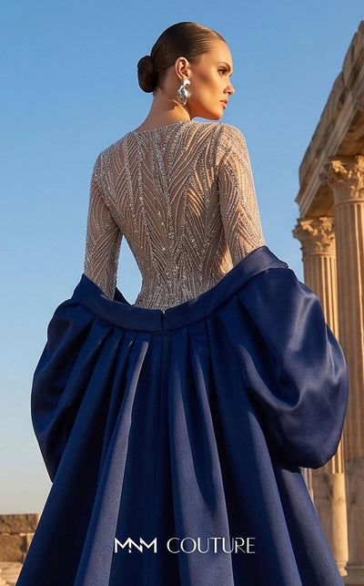 MNM Couture F03004 embroidered sequin mermaid gown with contrasting satin long cape, puffy sleeves, small train, and fitted silhouette | Couture Shop LA.