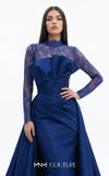 MNM Couture F03006A Chantilly lace and satin column gown featuring a high lace collar, sheer long sleeves, a 3D shoulder bow, an asymmetric ruched waist belt, stomach draping, and an open-front A-line overskirt | Couture Shop LA