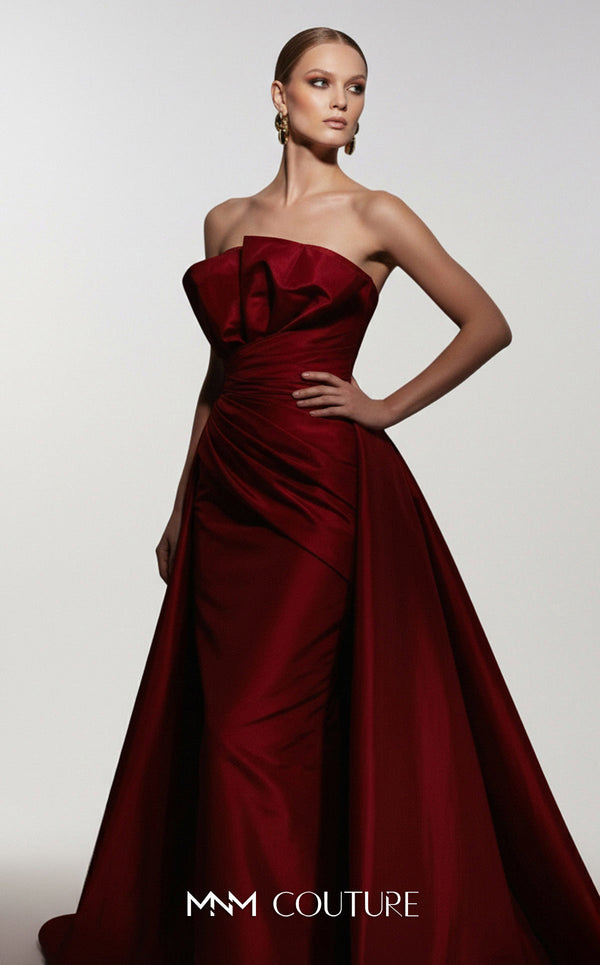 MNM Couture F03006 strapless taffeta column gown with arched neckline, pleated taffeta detail, and dramatic A-line overskirt train | Couture Shop LA.