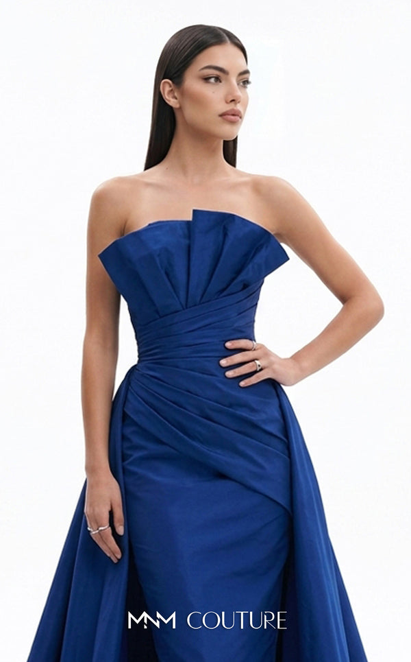 MNM Couture F03006 strapless taffeta column gown with arched neckline, pleated taffeta detail, and dramatic A-line overskirt train | Couture Shop LA.