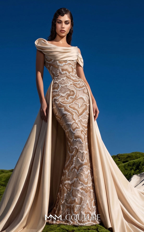 MNM Couture F03044 navy duchess satin gown with diagonal off-shoulder drape, sculptural right-shoulder petal, multicolor sequin-embroidered column, open-front A-line overskirt, and open back | Couture Shop LA.