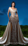 MNM Couture F03044 navy duchess satin gown with diagonal off-shoulder drape, sculptural right-shoulder petal, multicolor sequin-embroidered column, open-front A-line overskirt, and open back | Couture Shop LA.