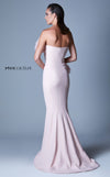 MNM Couture G1091 sleeveless mermaid-style gown with ruffled accents, beading, and pleated tail design. | Couture Shop LA