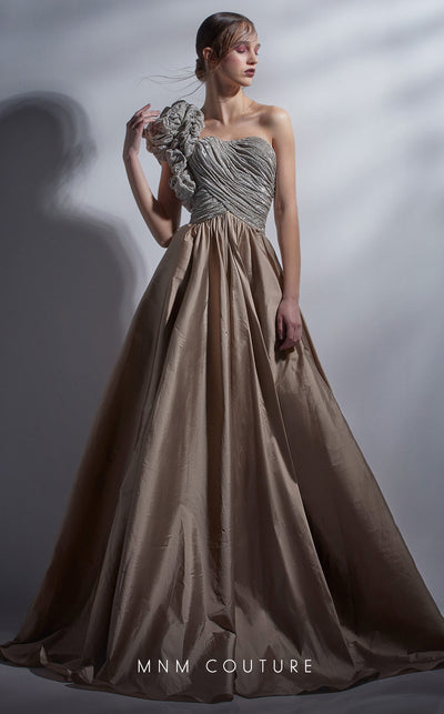 MNM Couture G1260 strapless metallic ball gown with bow design and flowing taffeta skirt. | Couture Shop LA