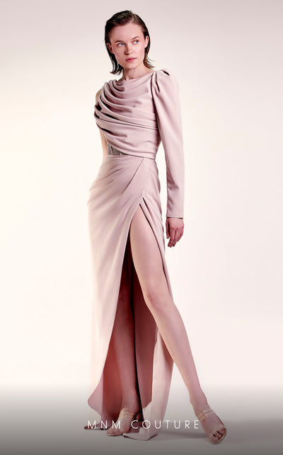 MNM Couture G1408 one-sleeve crepe column gown with boatneck neckline, rhinestone corseted waist, and draped floor-length skirt with slit | Couture Shop LA.
