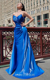 A glamorous MNM Couture G1419 metallic sheath gown featuring a strapless pleated bodice, faux-wrap design, pointed neckline, and a dramatic overskirt. | Couture Shop LA