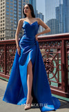 A glamorous MNM Couture G1419 metallic sheath gown featuring a strapless pleated bodice, faux-wrap design, pointed neckline, and a dramatic overskirt. | Couture Shop LA