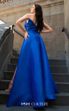 A glamorous MNM Couture G1419 metallic sheath gown featuring a strapless pleated bodice, faux-wrap design, pointed neckline, and a dramatic overskirt. | Couture Shop LA