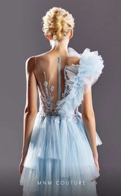 MNM Couture G1528 gown showcasing the beautiful asymmetrical ruffles and illusion straps. | Couture Shop LA