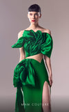 MNM Couture G1614 dress featuring the unique cutout design and luxurious green fabric. | Couture Shop LA