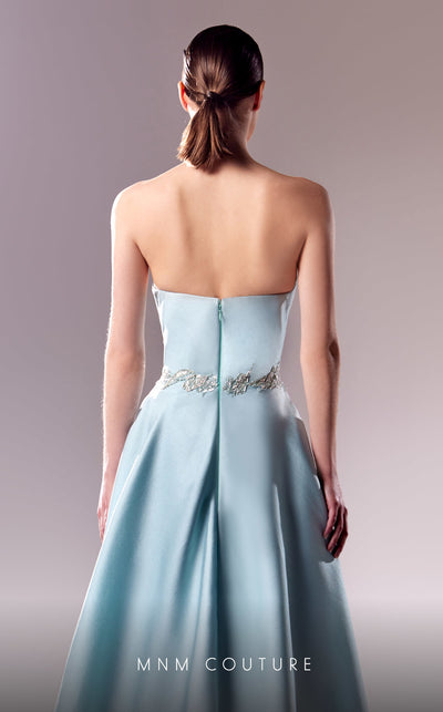MNM Couture G1627 gown showcasing the gorgeous lace details and elegant silhouette. | Couture Shop LA