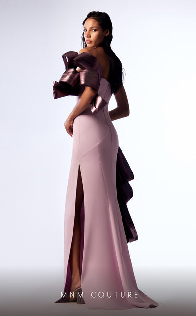 MNM Couture G1713 gown displaying the dramatic silhouette and eye-catching details. | Couture Shop LA
