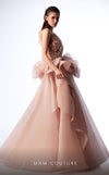 MNM Couture G1723 gown showcasing the stunning lace details and dramatic skirt. | Couture Shop LA
