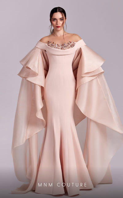 MNM Couture G1814 gown showcasing the luxurious crepe fabric and cascading sleeves. | Couture Shop LA