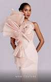 MNM Couture G1827 gown showcasing the fitted silhouette and dramatic ruffles on the shoulder. | Couture Shop LA