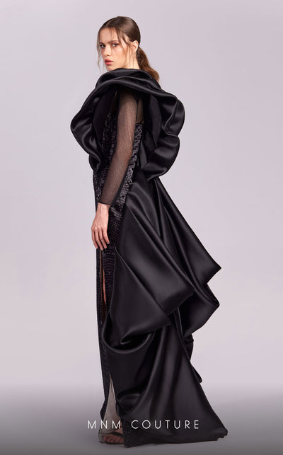 MNM Couture G1835 gown showcasing the dramatic ruffled shoulders and thigh-high slit. | Couture Shop LA
