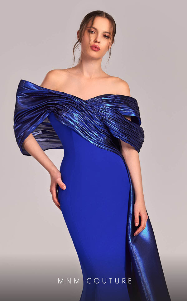 MNM Couture G1840 gown showcasing the elegant off-shoulder design and graceful mermaid skirt. | Couture Shop LA