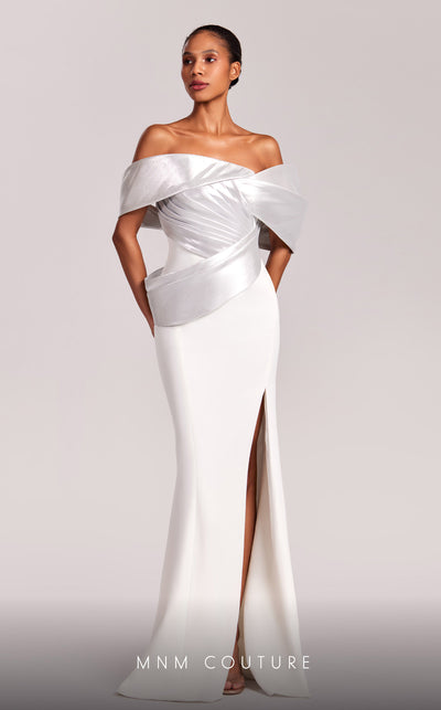 MNM Couture G1841 gown showcasing the elegant off-shoulder design and striking slit. | Couture Shop LA