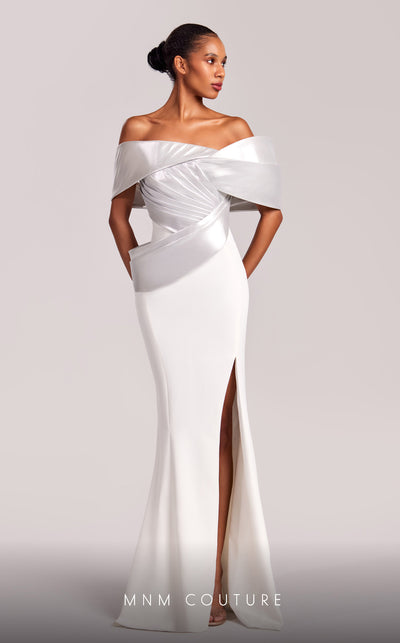 MNM Couture G1841 gown showcasing the elegant off-shoulder design and striking slit. | Couture Shop LA