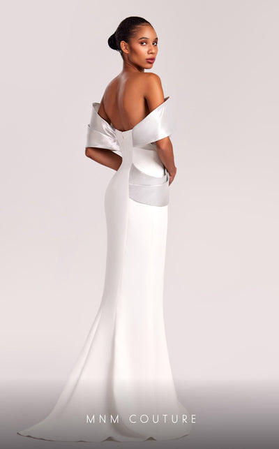 MNM Couture G1841 gown showcasing the elegant off-shoulder design and striking slit. | Couture Shop LA