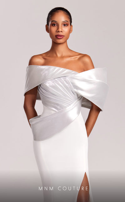 MNM Couture G1841 gown showcasing the elegant off-shoulder design and striking slit. | Couture Shop LA