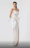 MNM Couture G1903 pearly off-white holographic gown with cascading peplum and high-slit detailing. | Couture Shop LA