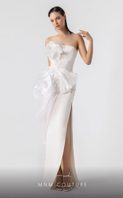 MNM Couture G1903 pearly off-white holographic gown with cascading peplum and high-slit detailing. | Couture Shop LA