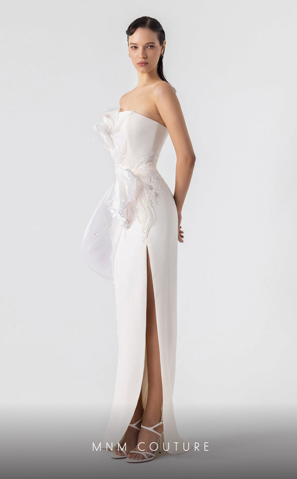MNM Couture G1903 pearly off-white holographic gown with cascading peplum and high-slit detailing. | Couture Shop LA