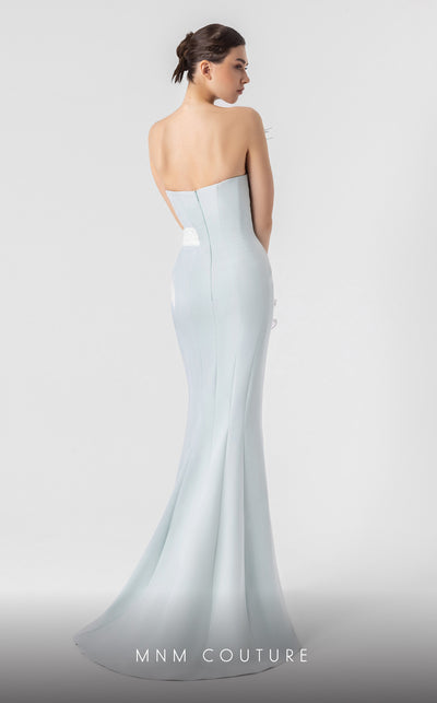 MNM Couture G1904 strapless mint blue mermaid gown with feather and holographic pleated organza detailing. | Couture Shop LA
