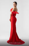 MNM Couture G1917 red mermaid gown with a plunging V-bodice and bold ruffled details. | Couture Shop LA