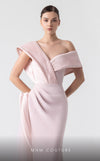 MNM Couture G1929 pink gown with asymmetrical pleats and flowing fabric for an elegant and timeless look. | Couture Shop LA