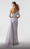 MNM Couture G1932 silver draped gown with off-shoulder design and high slit for evening elegance. | Couture Shop LA