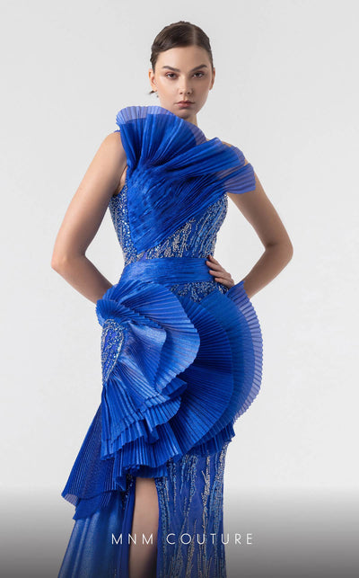 MNM Couture G1933 royal blue evening gown with cascading pleats and silver lace detailing. | Couture Shop LA