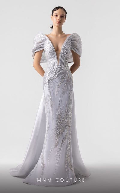 MNM Couture G1939 silver lace gown with off-shoulder details and shimmering embellishments. | Couture Shop LA