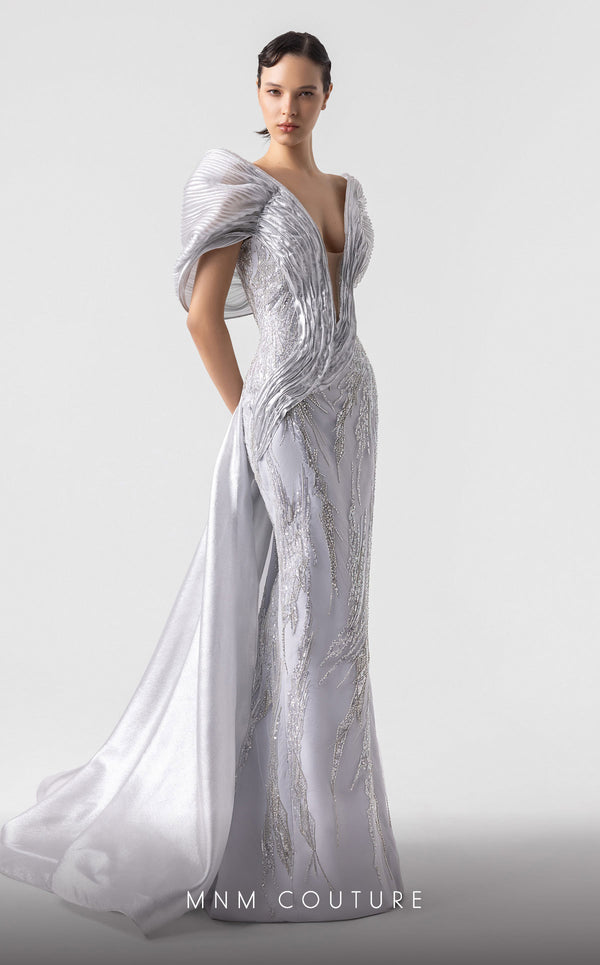 MNM Couture G1939 silver lace gown with off-shoulder details and shimmering embellishments. | Couture Shop LA
