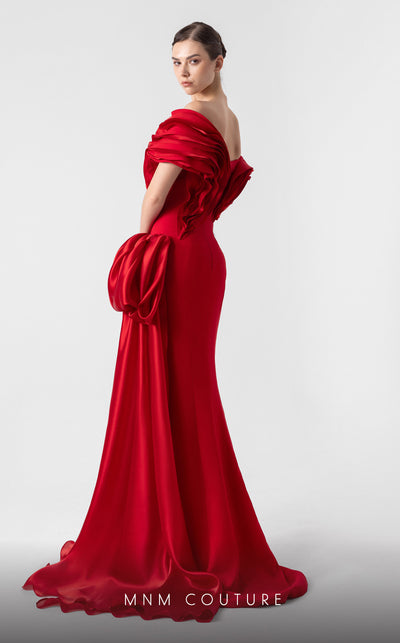 MNM Couture G1942 scarlet red gown with off-shoulder elegance and a bold organza side train. | Couture Shop LA