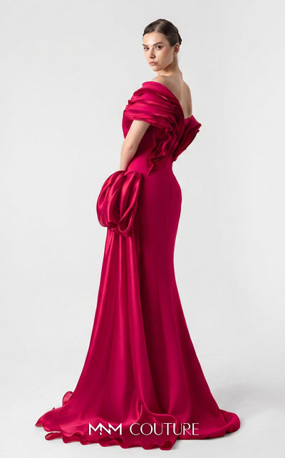 MNM Couture G1942 scarlet red gown with off-shoulder elegance and a bold organza side train. | Couture Shop LA