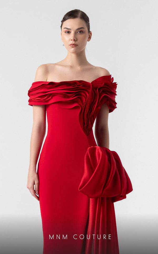 MNM Couture G1942 scarlet red gown with off-shoulder elegance and a bold organza side train. | Couture Shop LA