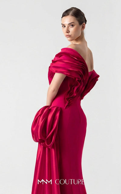 MNM Couture G1942 scarlet red gown with off-shoulder elegance and a bold organza side train. | Couture Shop LA