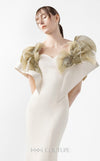 MNM Couture Style G2005 showcasing a cream mermaid gown with architectural golden pleated organza shoulder detailing resembling sculptural wings and ethereal fan accents | Couture Shop LA